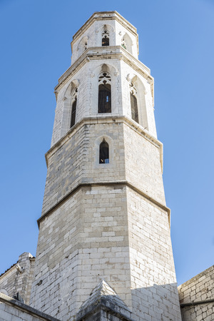 Bell tower of the church of Sant Pere de Figueres, Gothic style, in Girona, Catalonia, Spainの写真素材