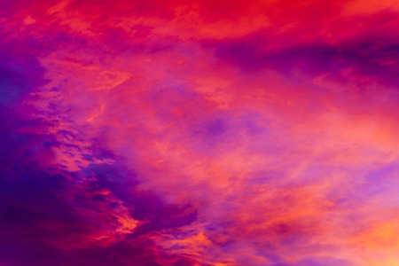 Colorful clouds on sunset sky. Natural background.の写真素材