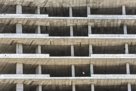 Building under construction with safety guard railsの写真素材