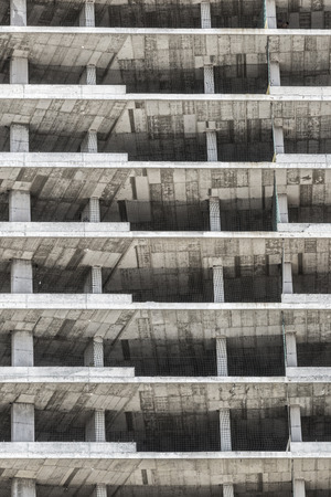 Building under construction with safety guard railsの写真素材