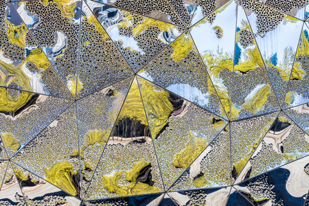 Abstract background on metal formed by triangles and multiple reflectionsの写真素材