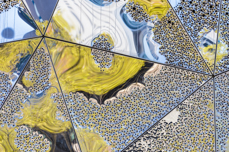 Abstract background on metal formed by triangles and multiple reflectionsの写真素材