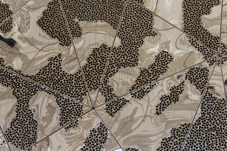 Abstract background on metal formed by triangles and multiple reflectionsの写真素材