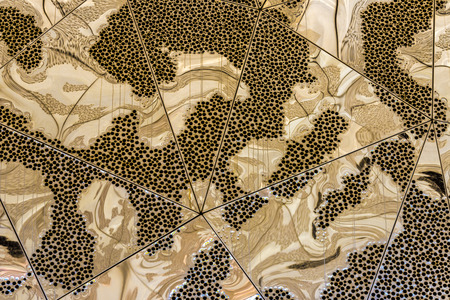 Abstract background on metal formed by triangles and multiple reflectionsの写真素材