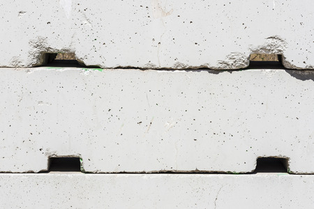 White concrete blocks placed above each other used as fenceの写真素材