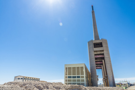 Thermal power plant closed with three chimneys in Barcelona, Catalonia, Spainの写真素材