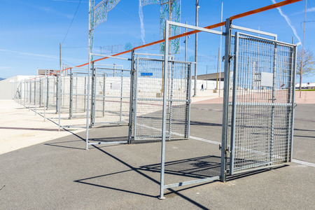 Row of entrance doors of a outdoor enclosureの写真素材