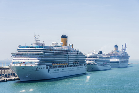 Barcelona, Spain - May 2, 2015: Three cruise ship docked at the cruise terminal in Barcelona, Catalonia, Spainのeditorial素材