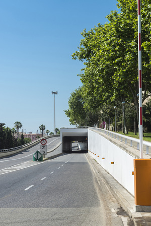 Road with raised barrier under a tunnel in Barcelona, Catalonia, Spainの写真素材