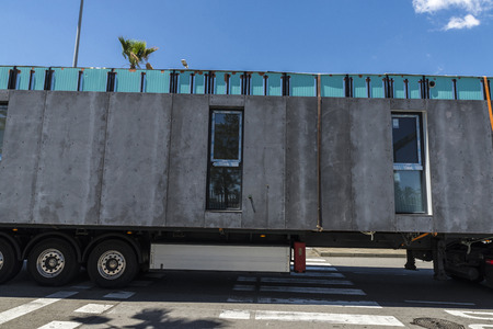 Truck carrying a module prefabricated concrete housing in Barcelona, Catalonia, Spainの写真素材