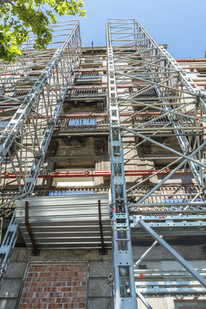 Construction of a building keeping the old facade through a system of beams in Barcelona, Catalonia, Spain.の写真素材