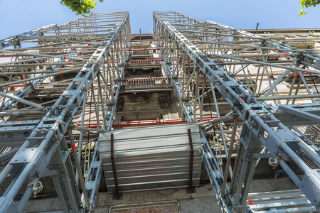 Construction of a building keeping the old facade through a system of beams in Barcelona, Catalonia, Spain.の写真素材