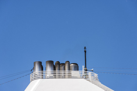 Chimneys of a modern and luxurious cruise against clean sky