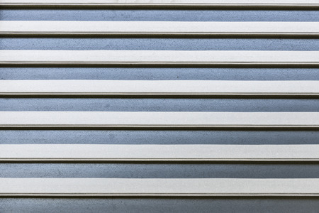 Closeup of a metal panel as backgroundの写真素材