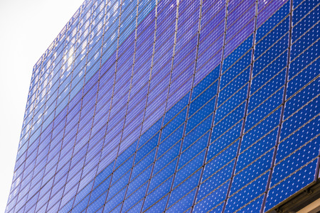 Solar panels placed on the facade of a building in Catalonia, Spain