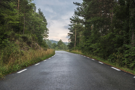 Mountain road on a rainy day in Catalonia, Spainの写真素材