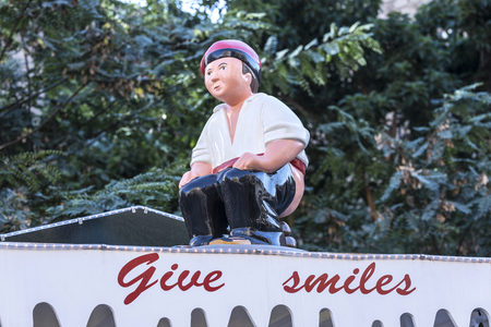Barcelona, Spain - December 19, 2014: Santa Llucia Fair is a Christmas market items where a significant figure is the Caganer, typical figure Catalan manger. This figure represents someone defecating, now you also put faces of famous people.のeditorial素材