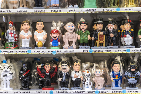 Barcelona, Spain - December 19, 2014: Santa Llucia Fair is a Christmas market items where a significant figure is the Caganer, typical figure Catalan manger. This figure represents someone defecating, now you also put faces of famous people.のeditorial素材