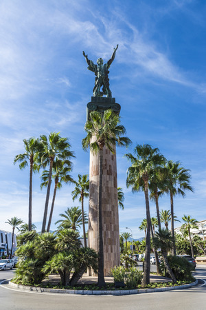 Victory statue, also known as the Russian statue, in Puerto Banus, a marina near Marbella in Costa del Sol, Spain. It created by sculptor Zurab Tsereteli, is a column of 30 meters crowned by a figure with outstretched arms.のeditorial素材