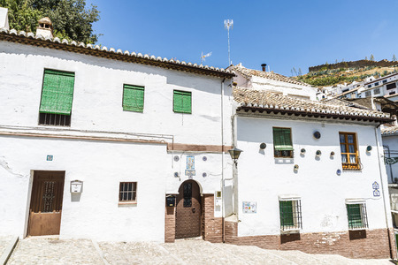 Granada, Spain - August 12, 2015: Street historical district of Albaicin, facing the hill of the Alhambra in Granada, Andalusia, Spainのeditorial素材