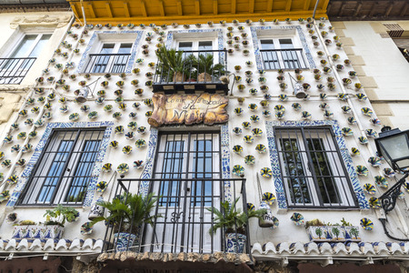 Granada, Spain - August 11, 2015: Facade of a restaurant in the old town of Granada, Andalusia, Spain.のeditorial素材