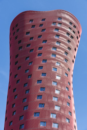 Barcelona, Spain - October 10, 2015: Hotel Porta Fira in L'Hospitalet de Llobregat, a suburb of Barcelona, Catalonia, Spain, is a modern red skyscraper hotel designed by Japanese architect Toyo Ito.のeditorial素材