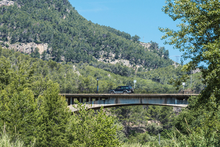terrain vehicle through a concrete bridge near Montanejos, Spainの写真素材