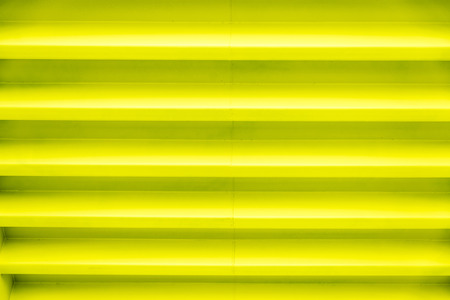 fluorescent ceiling beams as background with parallel lines