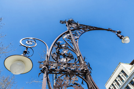 Modernist style streetlight, built in 1906 and recently restored on the Passeig de Gracia, Barcelona, Catalonia, Spainの写真素材