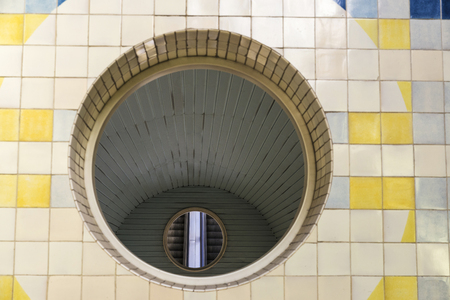 circles on the wall in the Lisbon subway forming abstract shapes in Portugalの写真素材