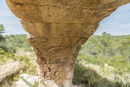 Detail of an arch of the roman aqueduct called Pont del Diable in Tarragona, Catalonia, Spainの写真素材