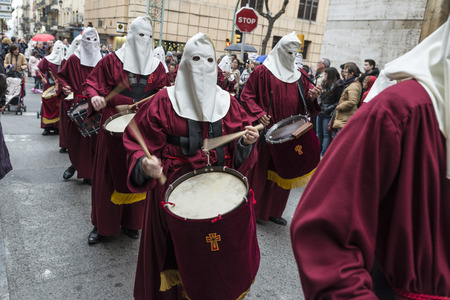 Tarragona, Spain - March 25, 2016: Easter Week, Holy Week or Semana Santa, Nazarene processions, bands of music, religious celebrations of international interest.のeditorial素材