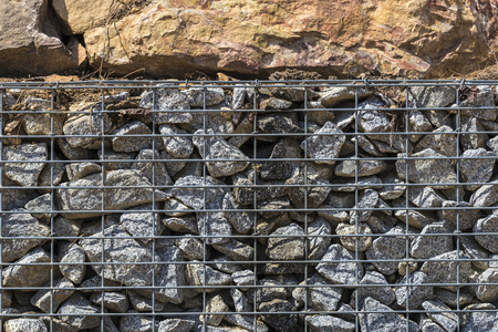 Old stone wall as backgroundの写真素材