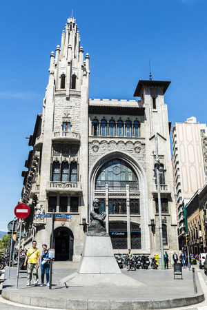 Barcelona, Spain - April 19, 2016: Former headquarters of CaixaBank. It is an Modernism style building with Gothic inspirations located in the old town of Barcelonaのeditorial素材
