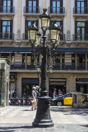 Barcelona, Spain - June 14, 2016: Black classic lamppost of wrought iron in Les Rambles of Barcelona, Catalonia, Spainのeditorial素材