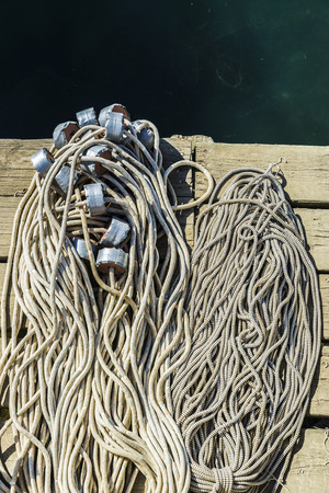 Lots of fishing nets in a port of the Costa Brava, Catalonia, Spainの写真素材