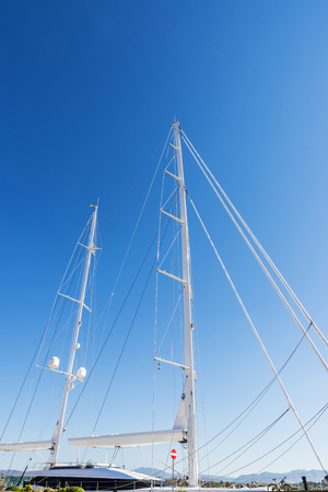 Luxury sailboat docked at the marina in Olbia, Sardinia, Italyの写真素材