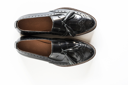 Female black fashionable shoes isolated on white backgroundの写真素材