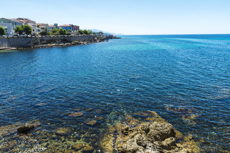 View of the fortification in the old town in Alghero, Sardinia, Italy