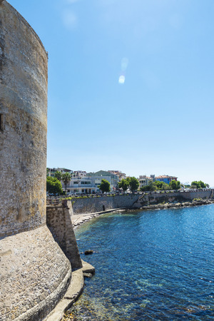 Tower of the fortification in the old town in Alghero, Sardinia, Italy