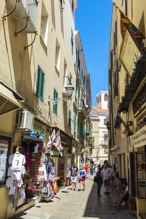 Alghero, Italy - August 26, 2016: Street of the old town with people walking in Alghero, Sardinia, Italyのeditorial素材