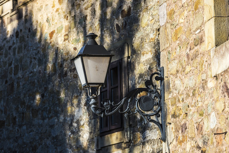 Old black lamppost of the medieval village of Lierganes in Cantabria, Spainの写真素材