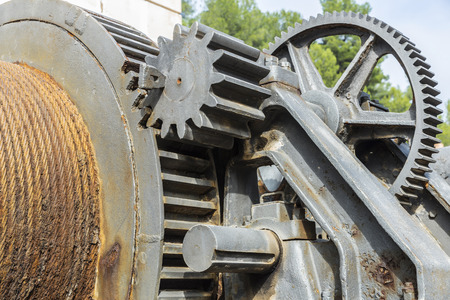 Large industrial pulley system with sprockets of the salt or potash mine in Cardona, Catalonia, Spainの写真素材