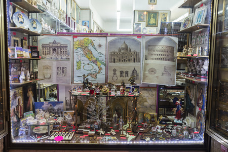 Rome, Italy - December 29, 2016: Souvenir shop with gifts, maps and religious figures in the historical center of Rome, Italyのeditorial素材