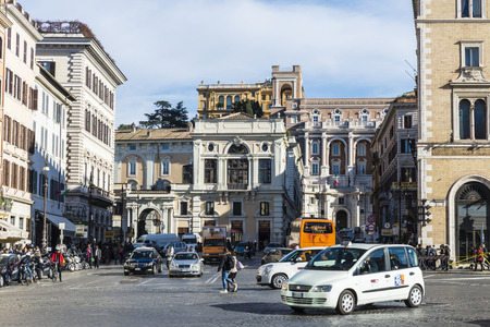 Rome, Italy - December 31, 2016: Traffic on a street and people walking in Rome, Italyのeditorial素材