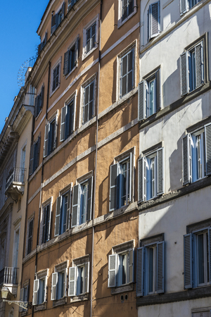 Facade of an old classic building in the historical center of Rome, Italyの写真素材