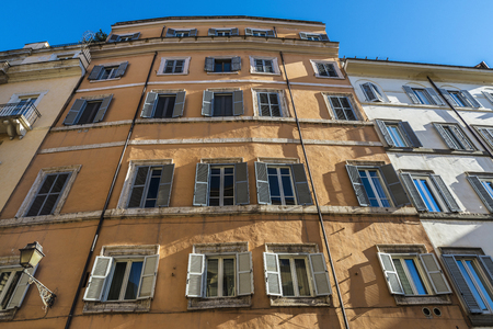 Facade of an old classic building in the historical center of Rome, Italyの写真素材