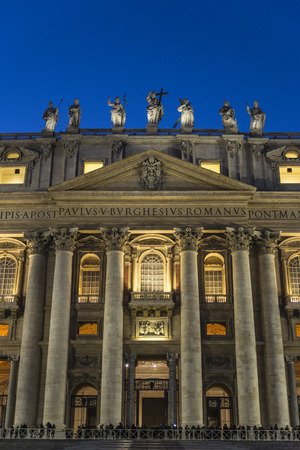 Papal basilica of Saint Peter at night full of tourists in Vatican City, Vaticanの写真素材