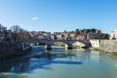 Bridge over the Tiber River passing through Rome in Rome, Italyの写真素材