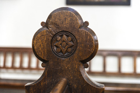 Decor on a wooden bench in St Mary church (Marienkirche) located near Alexanderplatz in Berlin, Germany.のeditorial素材